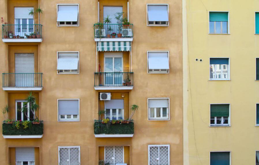 An apartment block with a grid-like layout of windows