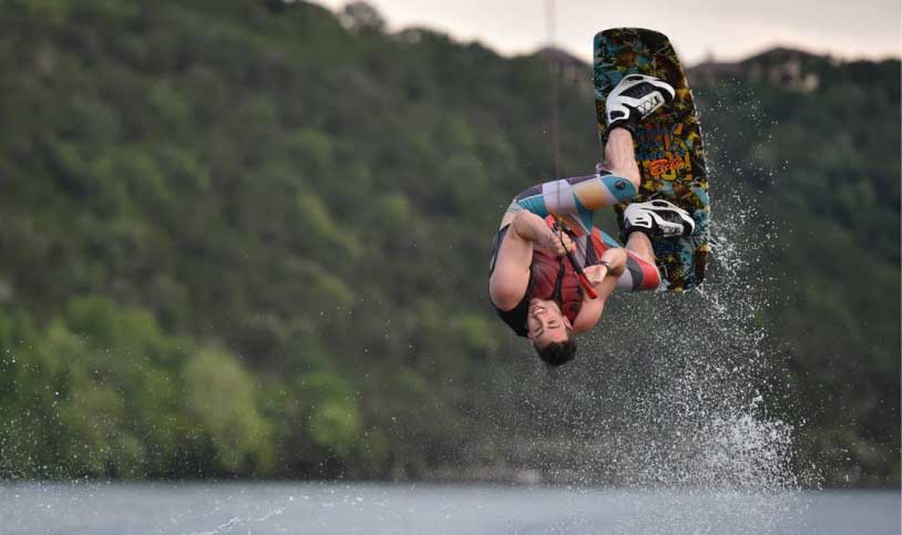 Person on wakeboard flipping