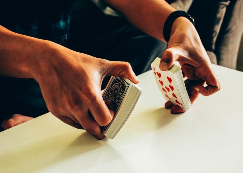 An image of cards being prepared to be shuffled