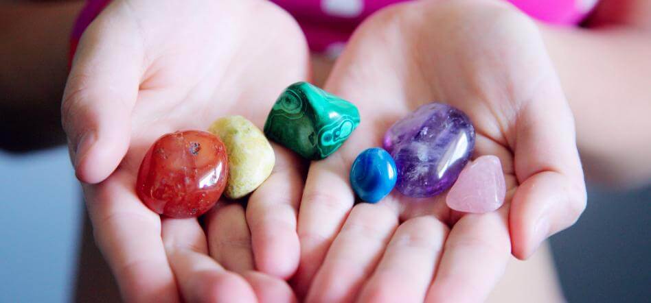 Woman holding polished stones