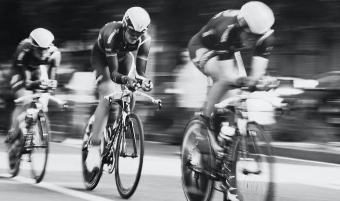 Three cyclists racing